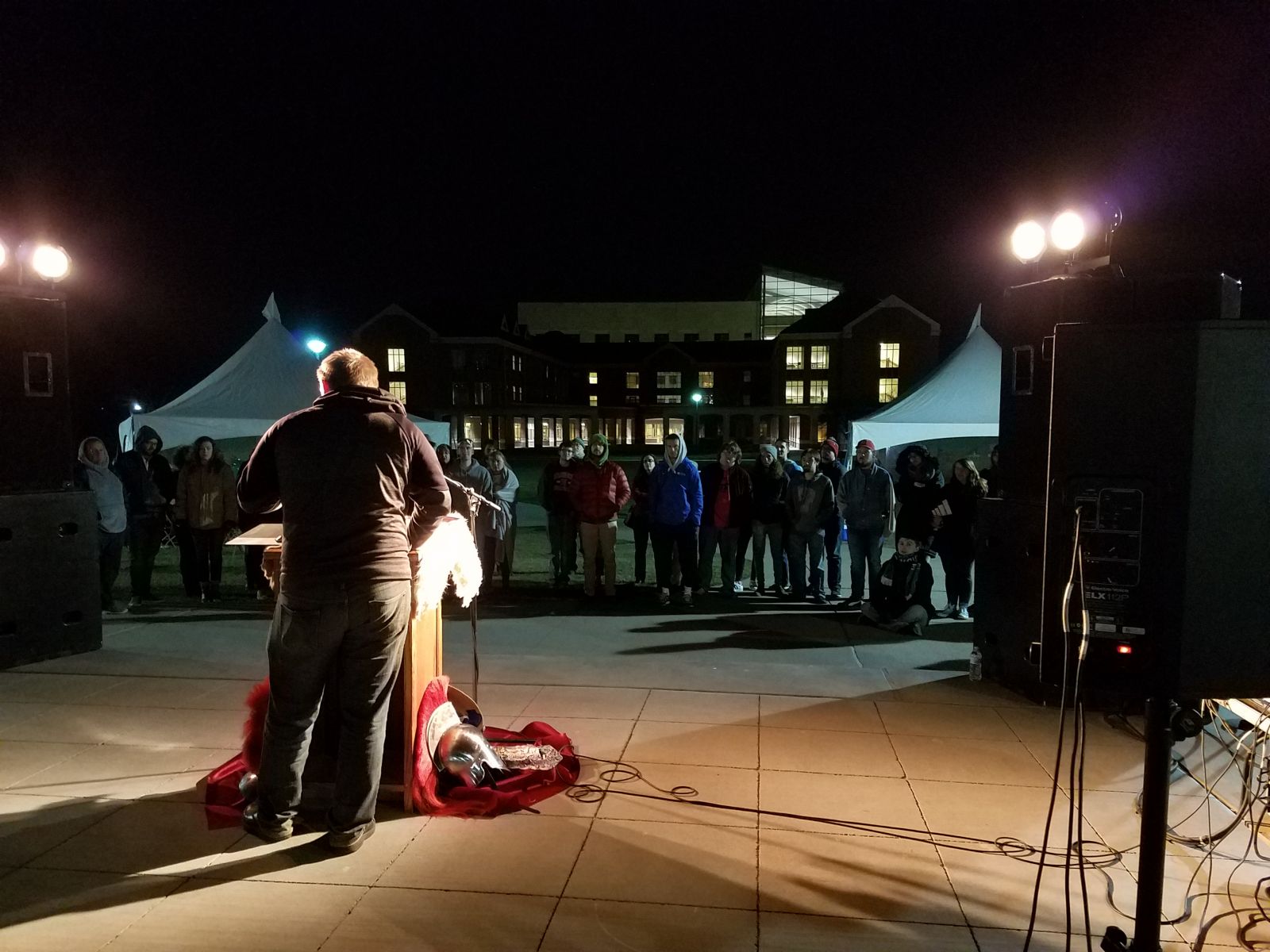 Alumnus Christian Laney reads from Book 24, around 3am. Photo by Nichole Brady and used by permission.