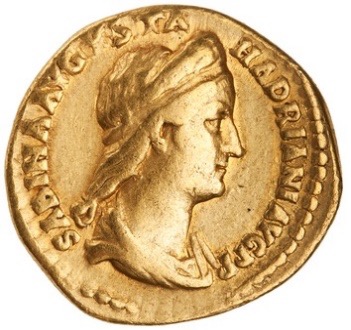 A gold coin featuring an image of Sabina looking to the right. Her hair is long and flowing without braids.