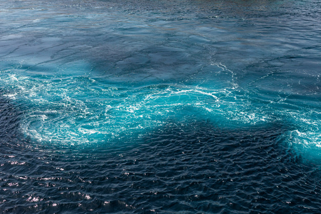 Image: Blue sea with waves. Image courtesy of Freepik.